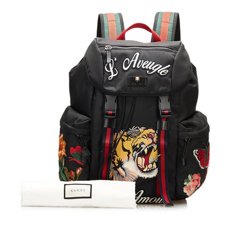 sacoche gucci aveugle par amour|Gucci Backpack L'Aveugle Par Amour Embroidered Web Strap .